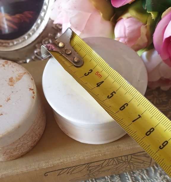Antique porcelain toothpaste holders |