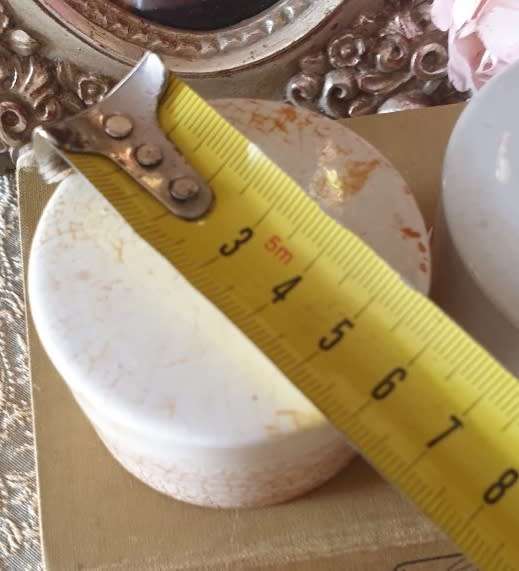 Antique porcelain toothpaste holders |