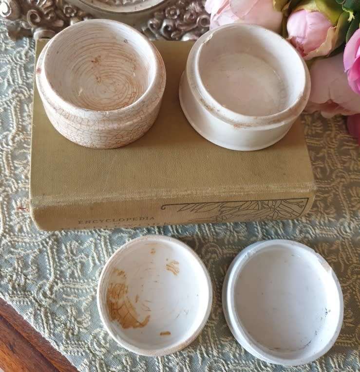 Antique porcelain toothpaste holders |