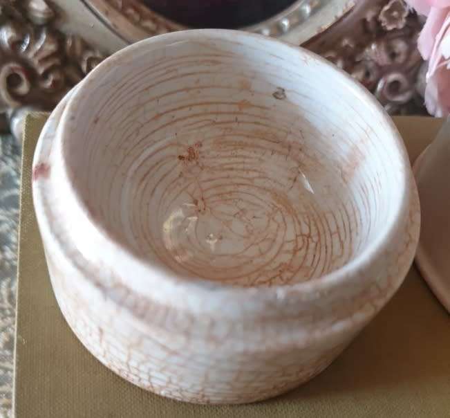 Antique porcelain toothpaste holders |