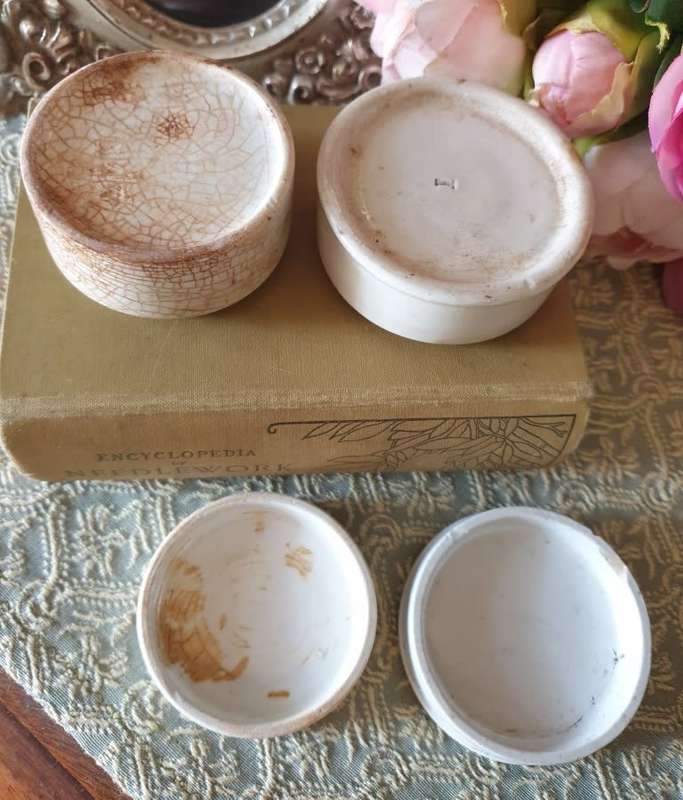 Antique porcelain toothpaste holders |