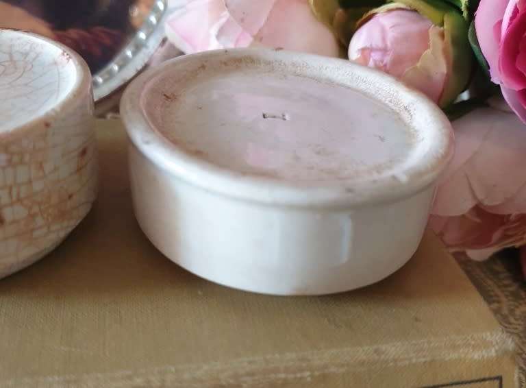Antique porcelain toothpaste holders |