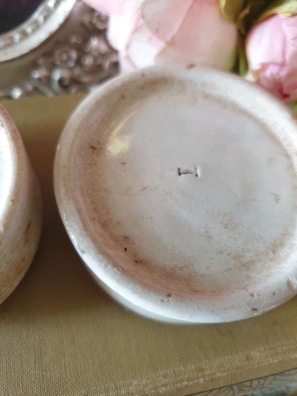 Antique porcelain toothpaste holders |