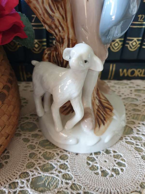 Beautiful vintage porcelain figurine of a young Lad with a lamb