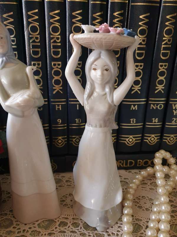 Beautiful vintage porcelain figurines of  young Ladies