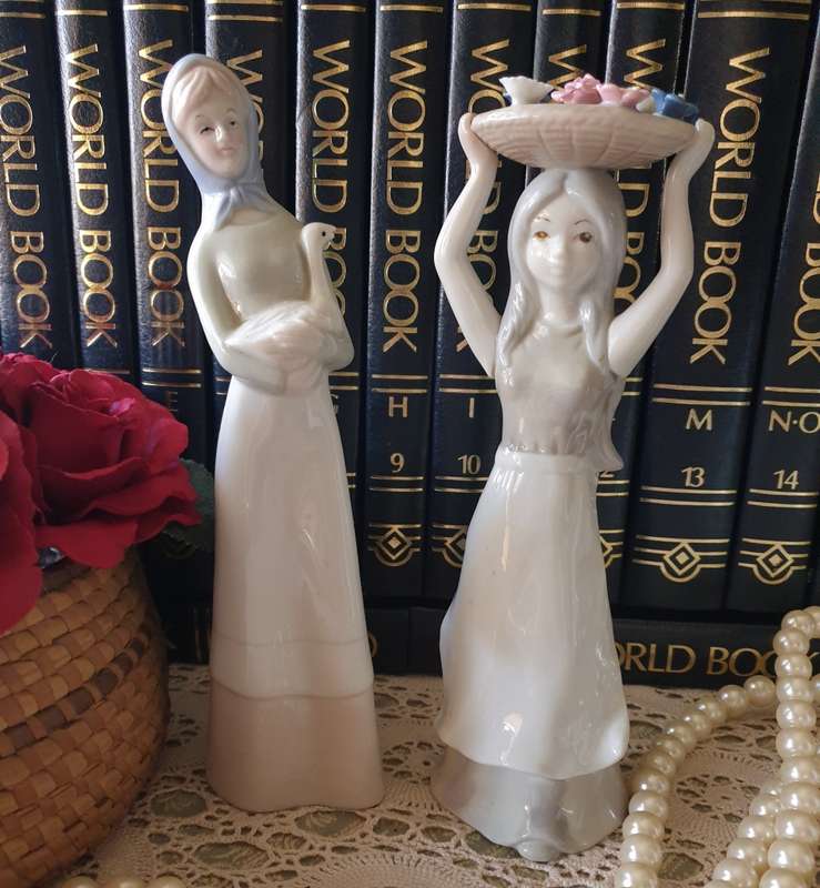 Beautiful vintage porcelain figurines of  young Ladies