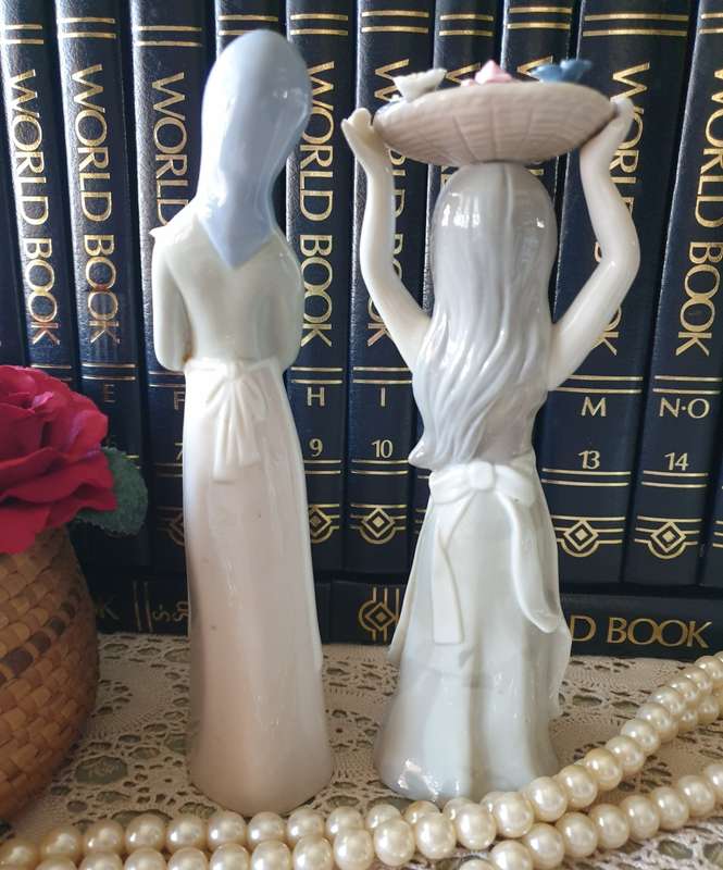 Beautiful vintage porcelain figurines of  young Ladies
