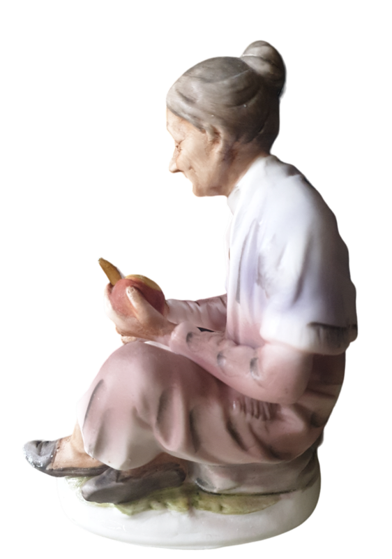 Vintage Ceramic Elderly Woman Sitting Peeling An Apple | Bisque Porcelain |