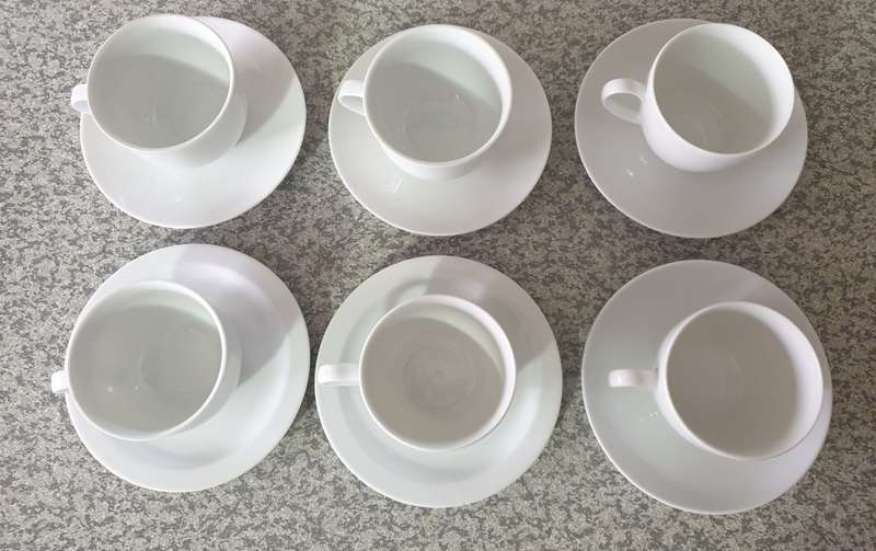 TEA CUPS AND SAUCERS
