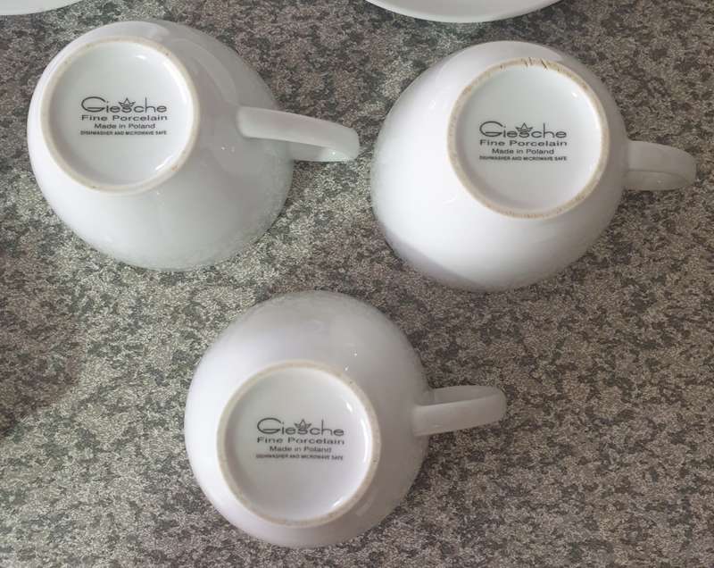 TEA CUPS AND SAUCERS
