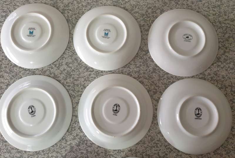 TEA CUPS AND SAUCERS