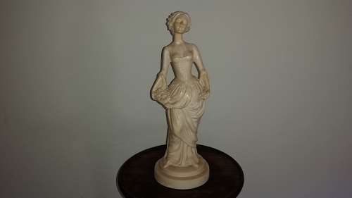 resin statue of lady in a dress very pretty