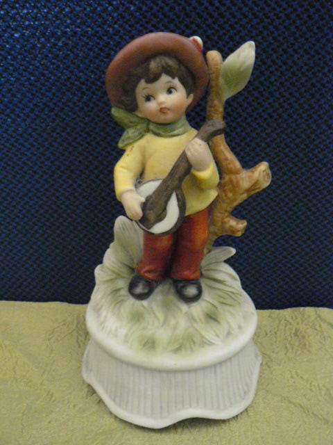 PORCELAIN FIGURINE BOY