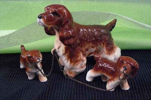 CAPRI HAND PAINTED PORCELAIN DOG AND 2 X PUPS