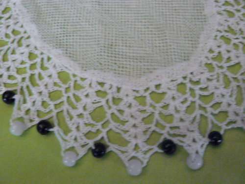 BLACK AND WHITE BEADED JUG COVER 21 CM
