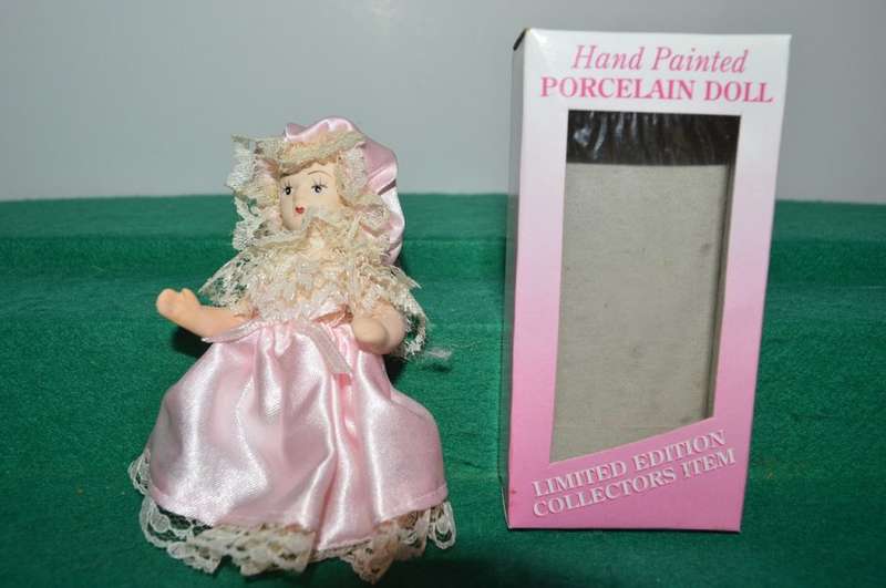 Limited edition full body minature porcelain vintage doll