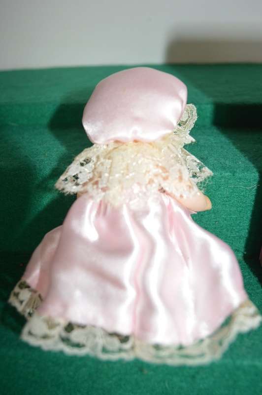 Limited edition full body minature porcelain vintage doll