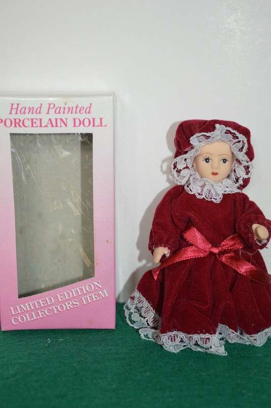 Limited edition full body minature porcelain vintage doll