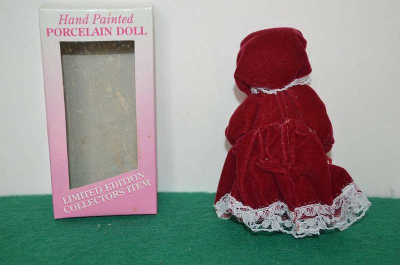 Limited edition full body minature porcelain vintage doll