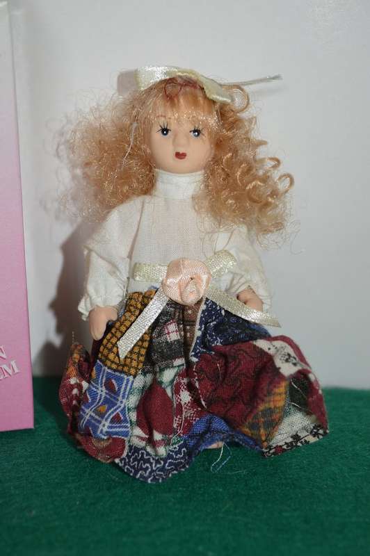 Limited edition full body minature porcelain vintage doll
