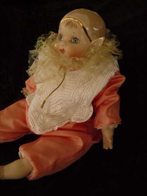 HAND PAINTED COLLECTABLE PIXIE - COMES WITH A HAND CHROCETED BIB, BECAUSE SOMETIMES HE GETS A BIT ME
