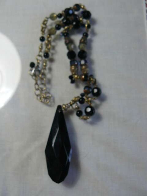 A STUNNING BEADDED NECKLACE WITH A LARGE BLACKSTONE