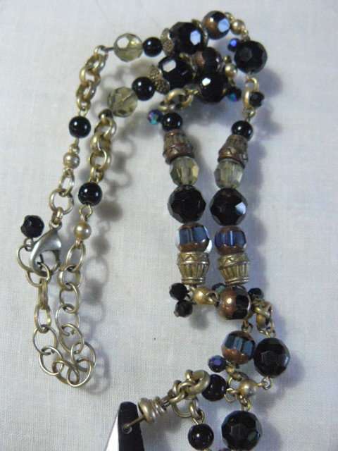 A STUNNING BEADDED NECKLACE WITH A LARGE BLACKSTONE