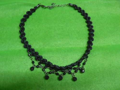 Very pretty material knotted necklace with blackheads