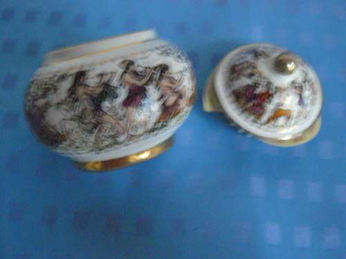 OPIUM CERAMIC PERFUME BOTTLE SOME CONTENTS