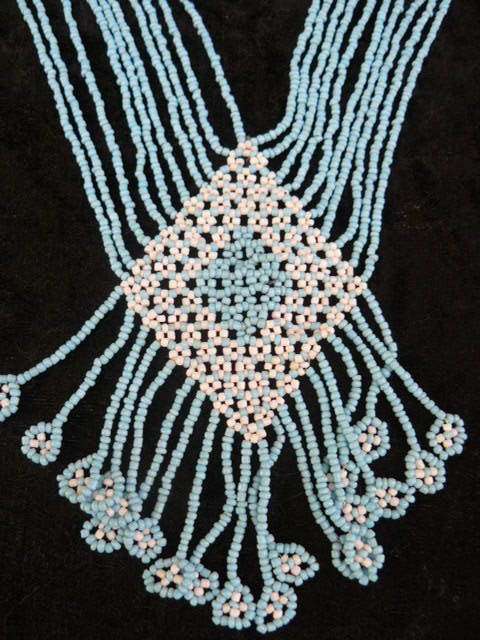 A STUNNING HAND BEADDED NECKLACE