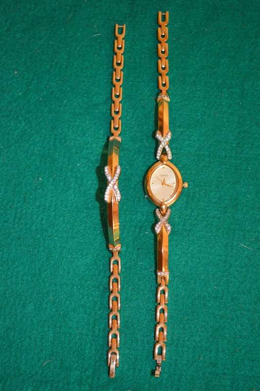 Beautiful set,  tempo quarts watch and matching bracelet like new