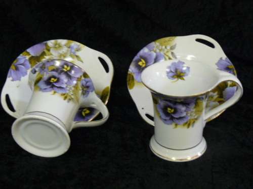 2 X CUPS AND SAUCERS