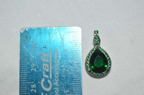 Stunning green stoned tear drop pendant