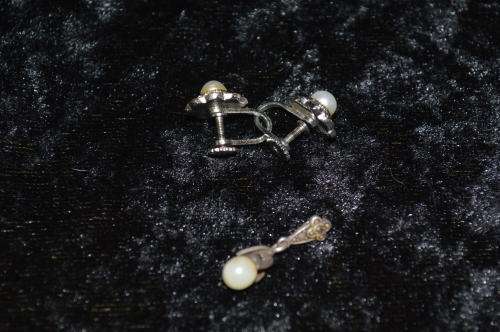 Very pretty ` faux pearl` and marcasite silver toned earrings and pendant set