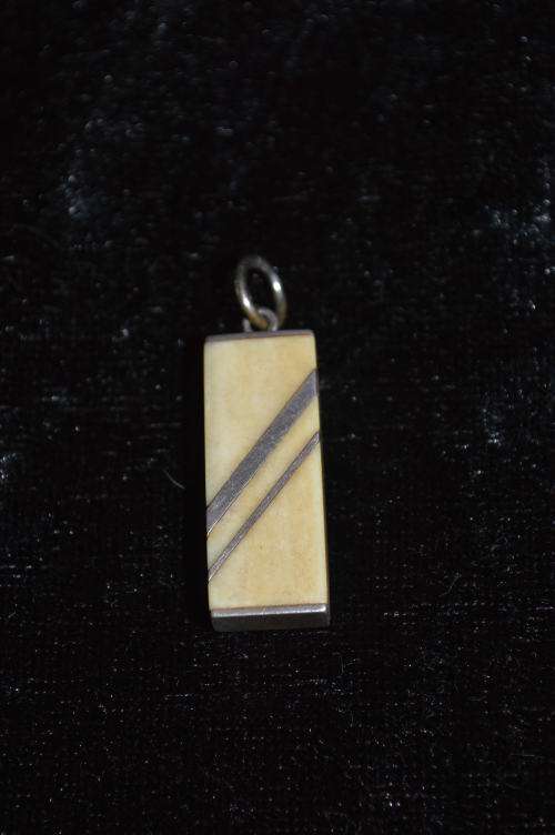 Silver stamped with bone pendant very art deco