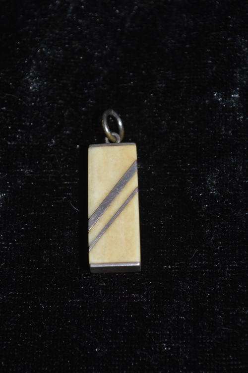 Silver stamped with bone pendant very art deco