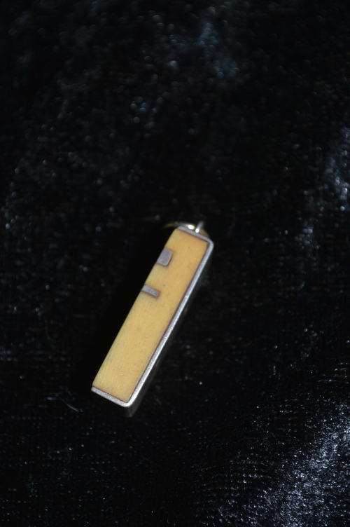Silver stamped with bone pendant very art deco