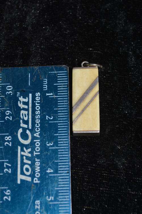 Silver stamped with bone pendant very art deco