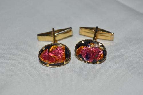 Cufflinks with resin encasing gold sheeting quite unusual