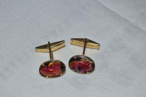 Cufflinks with resin encasing gold sheeting quite unusual