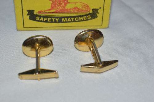 Cufflinks with resin encasing gold sheeting quite unusual