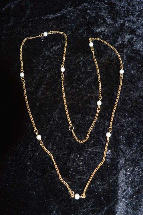Lovely dainty faux pearl necklace with gold trim