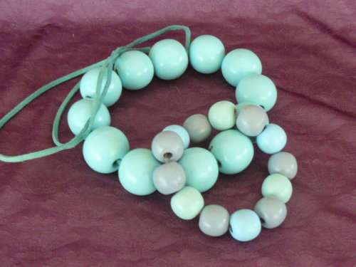 WOODEN BEADDED NECKLACE AND BRACELETT