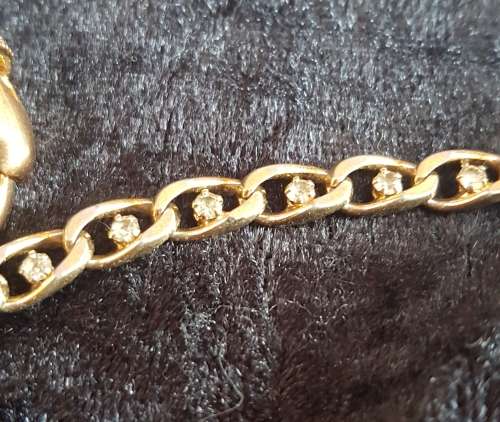 Gorgeous gold toned bracelet with shinny crystals and pearls and a large crystal ring