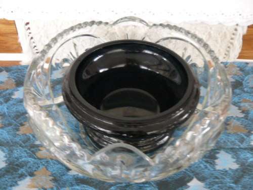 SOWERBY GLASS , FRUIT BOWL OR DISH CAN BE USED AS CHIPS DISH AND THE BLACK ONE FOR DIP . INTERESTING