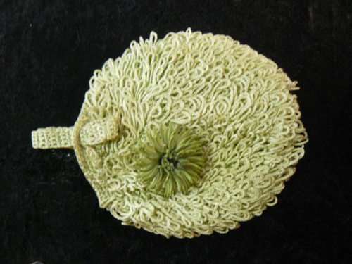 INTERESTING WRIST BAG AND FREE BROOCH