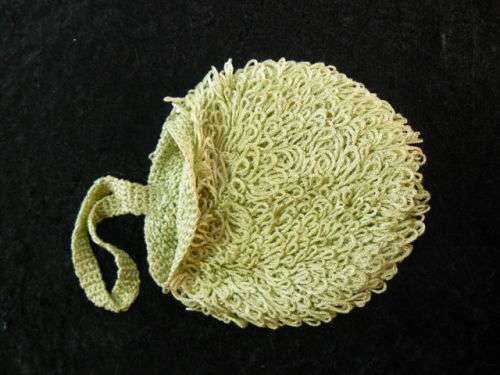 INTERESTING WRIST BAG AND FREE BROOCH