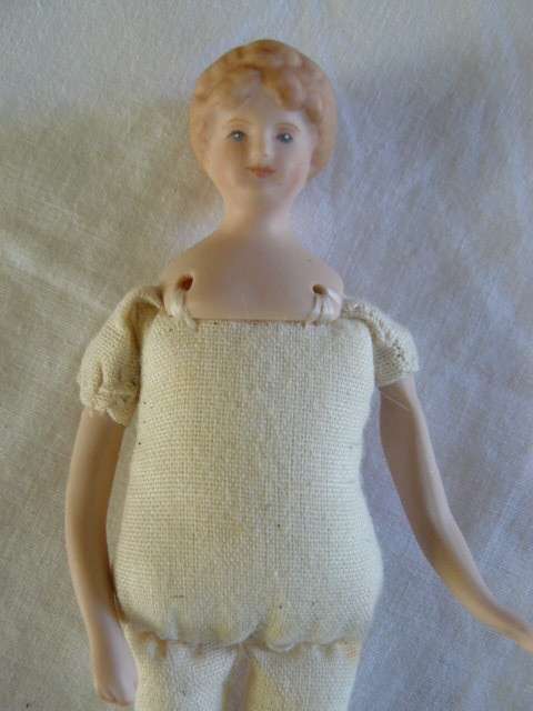 VINTAGE HAND PAINTED PORCELAIN AND MATERIAL DOLL 14 CM