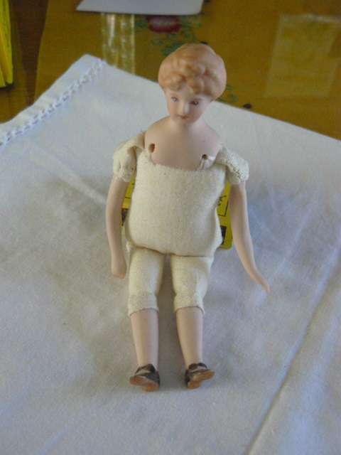 VINTAGE HAND PAINTED PORCELAIN AND MATERIAL DOLL 14 CM