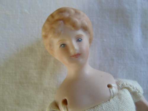 VINTAGE HAND PAINTED PORCELAIN AND MATERIAL DOLL 14 CM